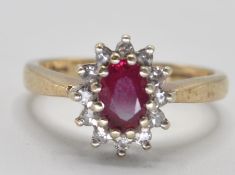 9CT GOLD RED STONE AND DIAMOND RING