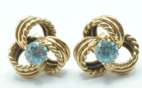 9CT GOLD AND BLUE STONE KNOT EARRINGS