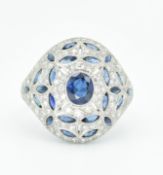 PLATINUM SAPPHIRE & DIAMOND DOME RING.