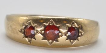 1970'S 9CT GOLD AND RED STONE GYPSY RING