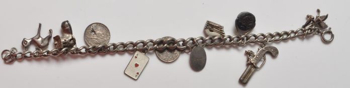 VINTAGE SILVER CHARM BRACELET