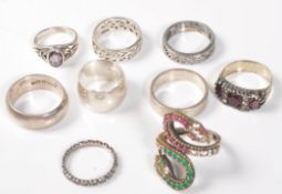 EIGHT SILVER 925 RINGS