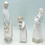 THREE SPANISH LLADRO CERAMIC PORCELAIN FIGURINES