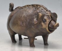 BRONZE HOTEL BELL IN THE FORM OF A PIG.