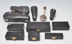 COLLECTION OF MINIATURE MUSICAL INSTRUMENTS