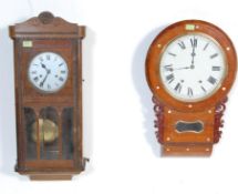 TWO 20TH CENTURY PENDULUM WALL COCKS