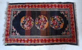 VINTAGE 20TH CENTURY HANDWOVEN TIBETAN RUG