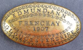 EARLY 20TH CENTURY BRASS TOBACCO TIN OF LOCAL INTEREST