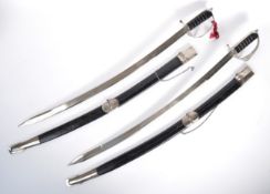 TWO EARLY 20TH CENTURY INDIAN CAVALRY SWORDS
