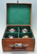 TWO SETS OF LAWN BOWLS OF WOODEN CONSTRUCTIONS