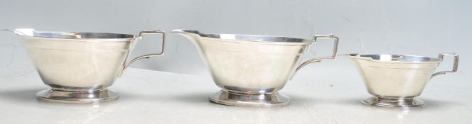 COLLECTION OF THREE ART DECO STERLING SILVER GRAVYBOATS