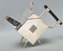 CONTEMPORARY TEAPOT IN THE MANNER OF CHRISTOPHER DRESSER.