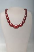 20TH CENTURY CHERRY AMBER BAKELITE BEADED NECKLACE