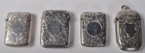 GROUP OF FOUR VICTORIAN SILVER HALLMARKED VESTA CASES.
