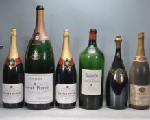 SIX VINTAGE ADVERTISING CHAMPAGNE BOTTLES