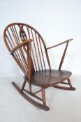 20TH CENTURY ERCOL ROCKING CHAIR MODEL 316 IN FLEUR DE LYS PATTERN