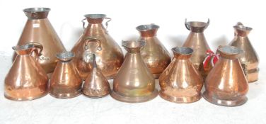 TEN VICTORIAN ANTIQUE COPPER MEASURING JUGS