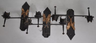 A COLLECTION OF THREE VINTAGE CAST METAL WALL SCONCES