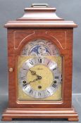 20TH CENTURY GERMAN MADE THREE TRAIN MOON PHASE BRACKET CLOCK.