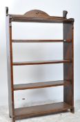 1920’S OAK OPEN WINDOW BOOKCASE IN THE MANNER OF LIBERTY