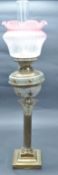 VICTORIAN BRASS COLUMN OIL LAMP WITH PINK GLASS SHADE.