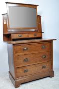 A CIRCA 1900S ART AND CRAFTS OAK DRESSING TABLE CHEST