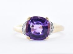 9CT GOLD PURPLE STONE AND DIAMOND RING