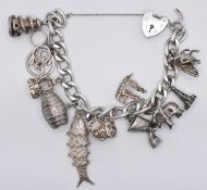 1970'S SILVER HALLMARKED CHARM BRACELET