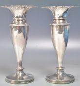 PAIR OF EDWARDIAN THOMAS HAYES SILVER STEM VASES