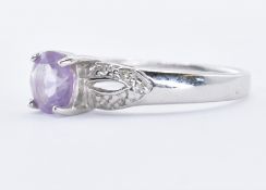 HALLMARKED WHITE GOLD DIAMOND & PURPLE STONE RING