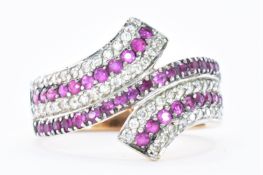 14CT GOLD DIAMOND AND RUBY CROSSOVER RING