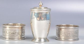 PAIR OF SILVER NAPKIN RINGS AND SILVER PEPPER POT