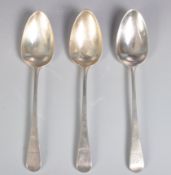 THREE GEORGE III HALLMARKED SILVER SERVING SPOONS.