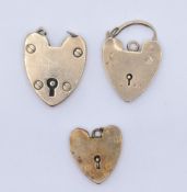 THREE 9CT GOLD HEART PADLOCK CLASPS