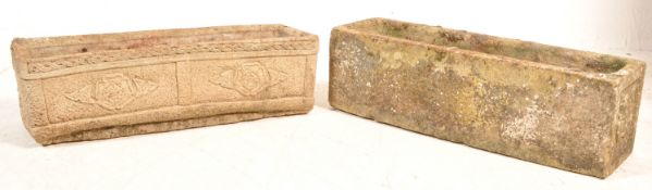 PAIR OF MID 20TH CENTURY COMPOSITE STONE PLANTER