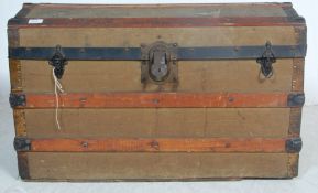 1930'S CANVAS COVERED SHIPPING TRUNK