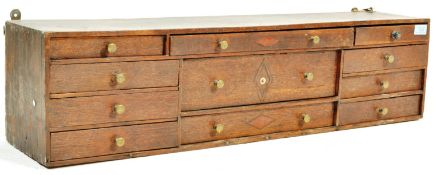 18TH CENTURY GEORGE III OAK WALL MOUNTED SET OF 11 DRAWERS