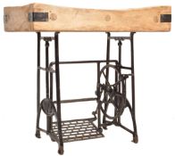 20TH CENTURY UPCYCLED WOODEN BUTCHERS BLOCK ON CAST IRON BASE