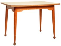 MID 20TH CENTURY BEECH AND FORMICA TOPPED DINING TABLE