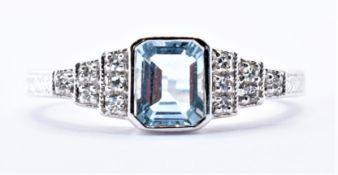 18CT WHITE GOLD AQUAMARINE AND DIAMOND RING