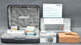 COLLECTION OF THREE 21ST CENTURY SPY CAMERAS