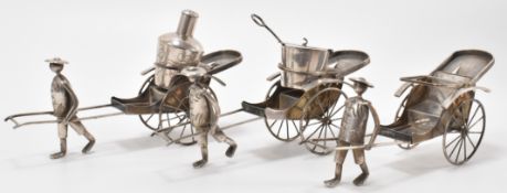 THREE SILVER ORIENTAL RICKSHAW CRUETS