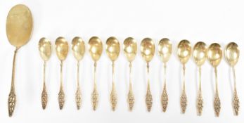 SIX CONTINENTAL SILVER GILT TEASPOONS & CAKE SLICE