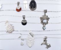 COLLECTION OF SILVER PENDANT NECKLACES