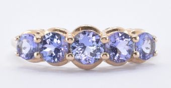 HALLMARKED 9CT GOLD & TANZANITE FIVE STONE RING