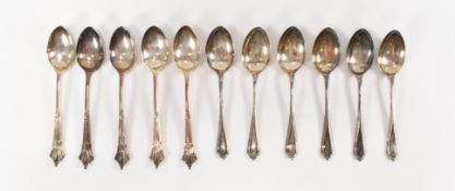 TWO SETS OF SILVER TEASPOONS