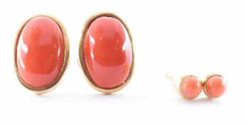 TWO PAIRS OF GOLD CORAL & RED GLASS STUD EARRINGS