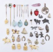 ASSORTMENT OF VINTAGE STICK PINS & CHARMS