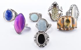 EIGHT SILVER STONE SET RINGS