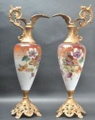 PAIR OF MID 20TH CENTURY HAND PAINTED WINE EWERS